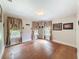 Cozy bedroom with hardwood floors, natural light, and neutral walls, creating a warm and inviting space at 800 W Lake Elbert Ne Dr, Winter Haven, FL 33881