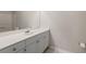 Bathroom featuring a vanity with white cabinets, a large mirror and ample counter space at 4014 Hemingway Cir # 4014, Haines City, FL 33844
