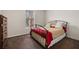 Cozy bedroom features a window and plush carpet at 4014 Hemingway Cir # 4014, Haines City, FL 33844