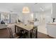 Open concept living space featuring a view of the dining area, kitchen, and living room at 4014 Hemingway Cir # 4014, Haines City, FL 33844
