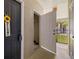 Hallway entrance featuring a storage closet, neutral paint, and a view of the outdoors at 4014 Hemingway Cir # 4014, Haines City, FL 33844