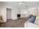 Open-concept living room leading to the dining and kitchen area with large windows at 4014 Hemingway Cir # 4014, Haines City, FL 33844