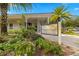 The Villas at Southern Dunes sales office features lush landscaping at 4014 Hemingway Cir # 4014, Haines City, FL 33844