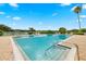 Relaxing community pool with a view of the palm trees at 4014 Hemingway Cir # 4014, Haines City, FL 33844