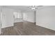 Bright and airy living room with hardwood flooring and open floor plan at 1 Zinnia E Ln, Poinciana, FL 34759