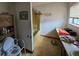 Bathroom featuring linoleum floor, cabinet, and a yellow bathtub with shower at 401 Pine Dr, Sanford, FL 32773