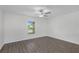 Clean room with ceiling fan and neutral walls and modern flooring at 414 Caribbean Ct, Poinciana, FL 34759