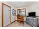 Eat-in kitchen area with a table, chairs, and natural light from the window at 492 Caribbean Dr, Lakeland, FL 33803