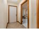 Inviting entryway featuring tile flooring, a white front door, and wood trim at 492 Caribbean Dr, Lakeland, FL 33803