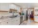 The kitchen has stainless steel appliances, and ample countertop space for food preparation at 492 Caribbean Dr, Lakeland, FL 33803