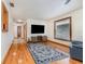 Bright living room with hardwood floors, large windows, and neutral wall colors at 492 Caribbean Dr, Lakeland, FL 33803
