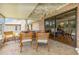 Covered patio with outdoor seating overlooking the backyard at 492 Caribbean Dr, Lakeland, FL 33803