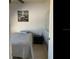 This bright bedroom has neutral decor, a comfy bed, and beachy artwork, creating a serene retreat at 2057 Swift Rd, Oviedo, FL 32766