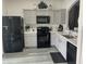 This well-equipped kitchen boasts modern appliances, sleek countertops, and ample storage for the home chef at 2057 Swift Rd, Oviedo, FL 32766
