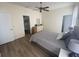 Relaxing main bedroom with a ceiling fan, walk-in closet, and ensuite bathroom at 2057 Swift Rd, Oviedo, FL 32766