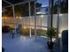 Relaxing screened patio with furniture and lighting offers a comfortable outdoor space at 2057 Swift Rd, Oviedo, FL 32766
