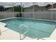 Sparkling in-ground pool featuring a screened enclosure and refreshing, clear water at 2057 Swift Rd, Oviedo, FL 32766