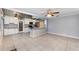 Charming kitchen area with grey and white accents and tile flooring at 220 Escambia Dr, Winter Haven, FL 33884