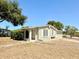 Charming single-story home featuring a well-maintained lawn and mature trees at 2201 Flamingo Ave, Deltona, FL 32738