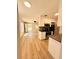 Modern kitchen with stainless steel appliances and wood-look flooring at 2201 Flamingo Ave, Deltona, FL 32738