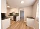 Modern kitchen featuring white cabinets, stainless steel appliances, and modern countertops at 2201 Flamingo Ave, Deltona, FL 32738