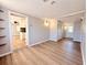 Living room showcasing neutral walls, updated flooring, and open floor plan at 2201 Flamingo Ave, Deltona, FL 32738
