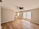 Spacious living room with modern flooring, neutral paint and ceiling fan at 2201 Flamingo Ave, Deltona, FL 32738