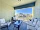 Private balcony with comfortable seating and serene neighborhood views at 9971 Highland Sky Aly, Orlando, FL 32832