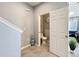 Hallway bathroom features neutral colors and plenty of room at 9971 Highland Sky Aly, Orlando, FL 32832