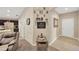 Interior hallway featuring neutral decor and access to the kitchen and other rooms at 305 St Georges Cir, Eagle Lake, FL 33839