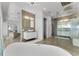 Open-concept bathroom with walk-in shower, tub, and dual sink vanity, creating a spa-like experience at 5500 W Lake Butler Rd, Windermere, FL 34786