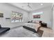 Bright, spacious bedroom with large windows showcasing beautiful outdoor view and stylish décor at 5500 W Lake Butler Rd, Windermere, FL 34786