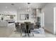 Elegant dining room with modern chandelier and a wine refrigerator at 5500 W Lake Butler Rd, Windermere, FL 34786