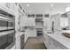 Well-equipped kitchen with stainless steel appliances, modern cabinetry, and plenty of counter space at 5500 W Lake Butler Rd, Windermere, FL 34786