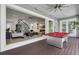 Inviting living room with an outdoor billiards area and water views at 5500 W Lake Butler Rd, Windermere, FL 34786