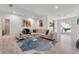 Bright living room with plush seating, colorful art, and an open layout perfect for entertaining or relaxing in style at 5500 W Lake Butler Rd, Windermere, FL 34786