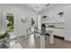 Bright home office featuring stylish decor, modern desk, and access to outdoor views at 5500 W Lake Butler Rd, Windermere, FL 34786