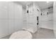Spacious walk-in closet with custom shelving, drawers, and plenty of hanging space at 5500 W Lake Butler Rd, Windermere, FL 34786