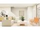 Comfortable living room with sectional sofa, stylish decor, and ample natural light, creating a cozy space at 7314 Ivy Tendril Ave, Orlando, FL 32829