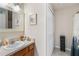 Well-maintained bathroom featuring neutral tones, vanity, and shower-tub combination at 7759 Sugar Bend Dr # 7759, Orlando, FL 32819