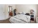 Bedroom featuring a glimpse into a bathroom with a sink and toilet plus closet at 7759 Sugar Bend Dr # 7759, Orlando, FL 32819