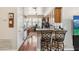 Inviting kitchen features granite countertops, wood floors, breakfast bar, and stainless steel appliances at 7759 Sugar Bend Dr # 7759, Orlando, FL 32819