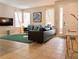 Bright living room showcasing plush seating, natural lighting, and contemporary decor at 1030 Marcello Blvd, Kissimmee, FL 34746
