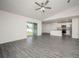 Bright living space featuring open layout, seamlessly connecting living area to the kitchen at 181 Cimarron Ln, Poinciana, FL 34759