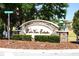 Lake Van Estates community entrance sign, with brick pillars and lush landscaping at 1886 Van Gogh Dr, Auburndale, FL 33823