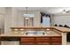 Kitchen with countertop seating, stainless steel appliances, and ample cabinet space at 5060 Se 40Th St, Ocala, FL 34480