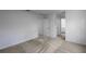 Spacious bedroom featuring plush carpeting and ample natural light at 563 Bay Leaf Dr, Poinciana, FL 34759