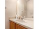 Bathroom vanity with a neutral countertop and a large mirror above the sink at 140 Napoli Dr, Davenport, FL 33897