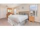 Inviting bedroom with matching side tables, a full bed, and plenty of closet space at 140 Napoli Dr, Davenport, FL 33897