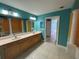 Spacious Primary bath with double vanity sinks, plenty of counter space and a view to the tub at 2300 N Atlantic Ave # 1502, Daytona Beach, FL 32118